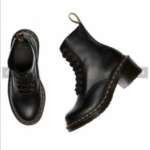 Pre owned heeled Dr.Marten Clemency boots.